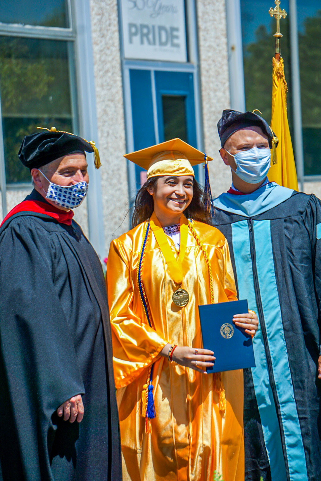 Holy Spirit drive-through diploma pickup
